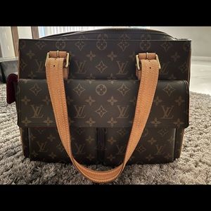 Multipli-Cite Red suede lined Purse.